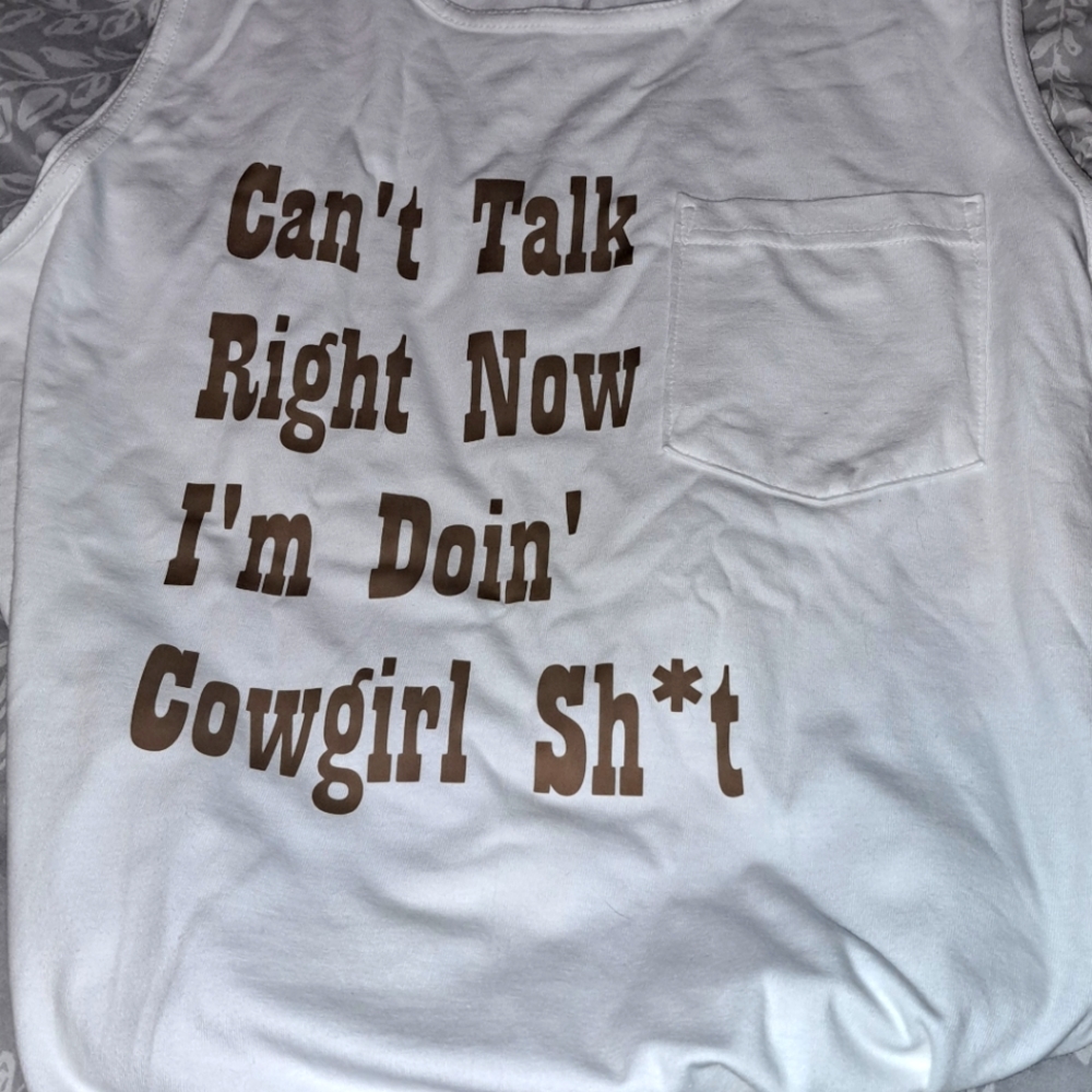 Custom white tank. Size is men medium but fits like a women's large,xl.